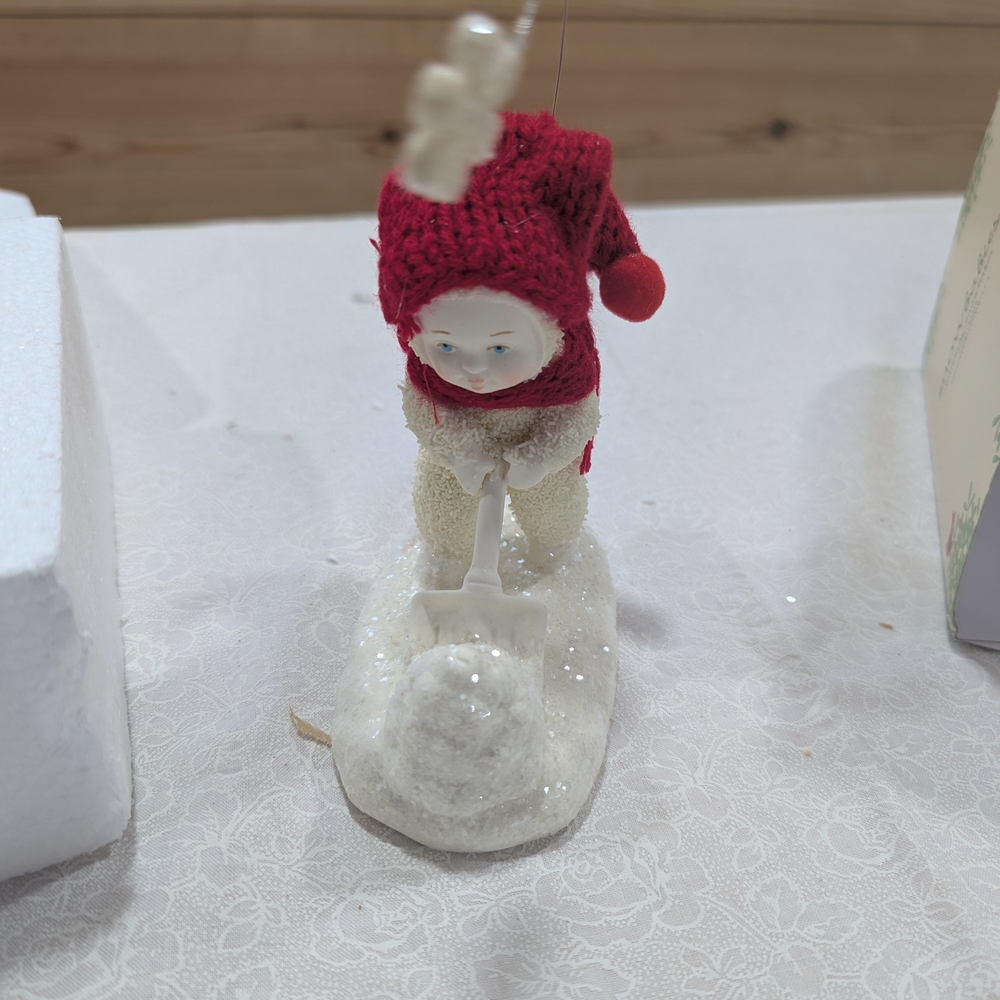 Red and White Ceramic Snowman Figurine